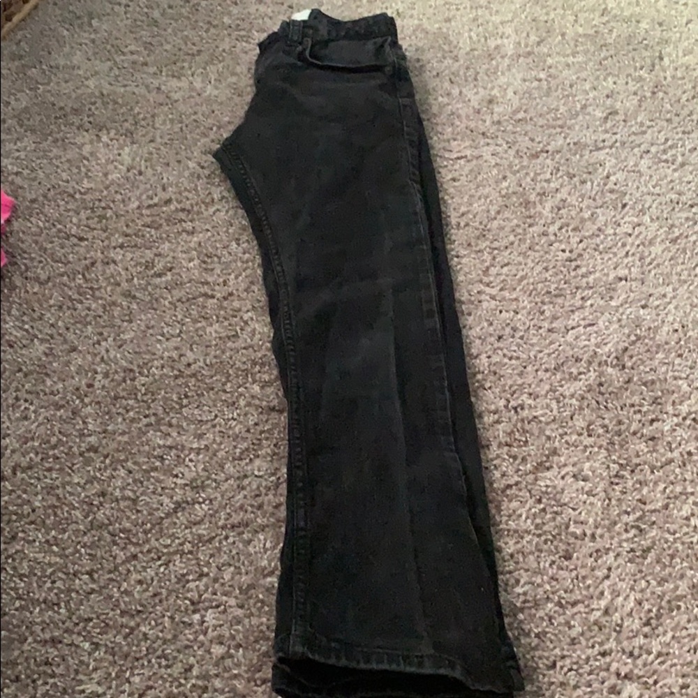 Distressed black girls Levi 511 jeans